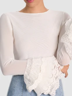 DELAINA TOP WITH RUFFLE CUFF